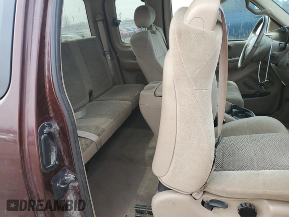 2001 Ford F-150 XL with VIN 1FTRX18L61NB40999, listed as a Copart auction lot 49641305 with 216,452 mi miles and Salvage Title. Bid and sale history available at carsss.com. Image 10.