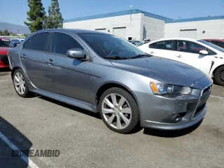 2015 Mitsubishi Lancer GT with VIN JA32U8FW6FU019871, listed as a Copart auction lot 68389694 with 106,523 mi miles and Salvage Title. Bid and sale history available at carsss.com. Image 4.