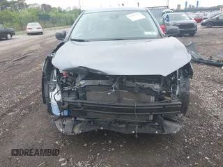 2022 Toyota Corolla Cross L with VIN 7MUAAABG0NV024424, listed as a IAAI auction lot 42261227 with 20,171 mi miles and . Bid and sale history available at DreamBid. Image 12.