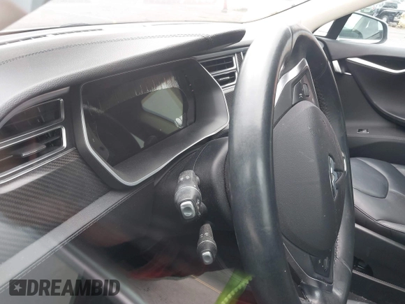 2014 Tesla Model S 60 with VIN 5YJSA1S13EFP53662, listed as a IAAI auction lot 42249930 with Not provided miles and . Bid and sale history available at DreamBid. Image 17.