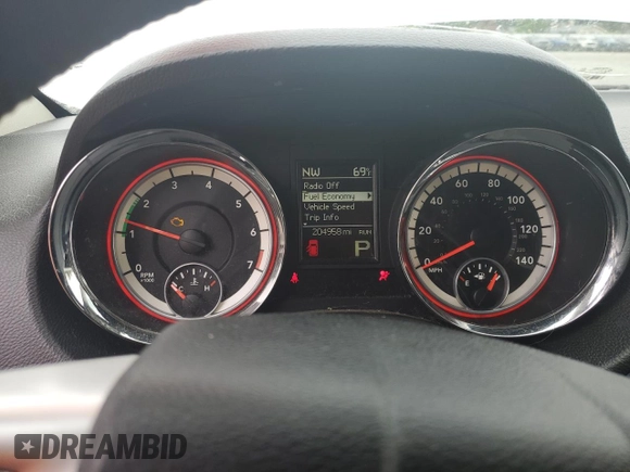 2013 Dodge Durango SXT with VIN 1C4RDJAG8DC668145, listed as a Copart auction lot 62749645 with 204,958 mi miles and Clean title. Bid and sale history available at DreamBid. Image 9.