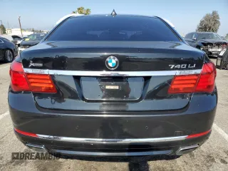 2015 BMW 7 Series 740Li xDrive z VIN WBAYF4C5XFG291765, wystawiony jako Copart lot #58619305 z przebiegiem 174 334 mil mil oraz Szkody całkowita. Historia ofert i sprzedaży dostępna na DreamBid. Obrazek 6.