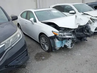 2016 Lexus ES 330 with VIN JTHBK1GG9G2227020, listed as a IAAI auction lot 42121533 with 63,334 mi miles and . Bid and sale history available at DreamBid. Image 1.