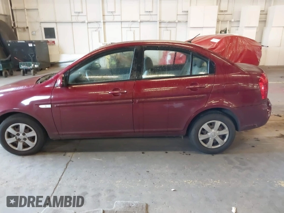 2007 Hyundai Accent GLS with VIN KMHCN46C27U111106, listed as a IAAI auction lot 41383317 with 147,882 mi miles. Bid and sale history available at carsss.com. Image 15.