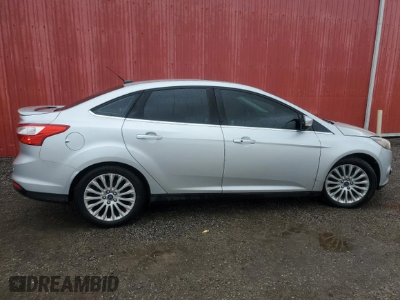 2012 Ford Focus Titanium с VIN 1FAHP3J27CL380382, выставлен на аукционе Copart как лот 54544105 с пробегом 222 775 миль миль и Чистый • Clean title. История ставок и продаж доступна на DreamBid. Изображение 3.