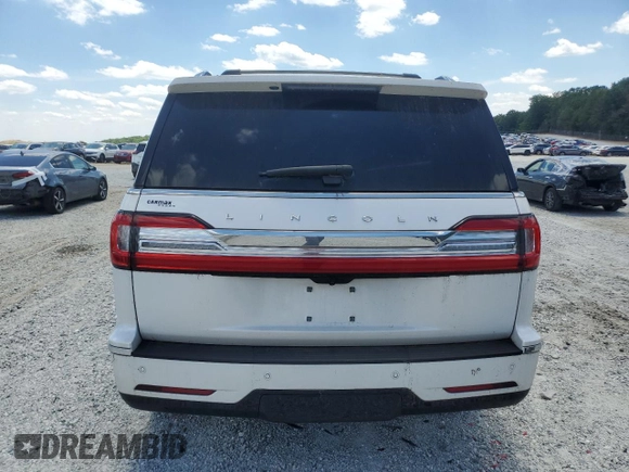 2019 Lincoln Navigator Reserve z VIN 5LMJJ2LT9KEL19544, wystawiony jako Copart lot #52240315 z przebiegiem 74 144 mil mil oraz Szkoda całkowita • Salvage title. Historia ofert i sprzedaży dostępna na DreamBid. Obrazek 6.