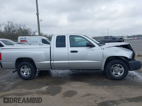 2005 Dodge Dakota ST with VIN 1D7HE22K25S119460, listed as a IAAI auction lot 41790592 with 104,995 mi miles and . Bid and sale history available at DreamBid. Image 13.