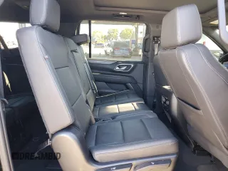 2023 Chevrolet Suburban z VIN 1GNSKDKL2PR286237, wystawiony jako Copart lot #46179735 z przebiegiem 29 518 mil mil oraz Szkoda całkowita • Salvage title. Historia ofert i sprzedaży dostępna na DreamBid. Obrazek 11.