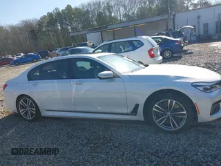 2017 BMW 7 Series 750i with VIN WBA7F0C34HGM21738, listed as a IAAI auction lot 41772933 with 62,923 mi miles and . Bid and sale history available at carsss.com. Image 13.