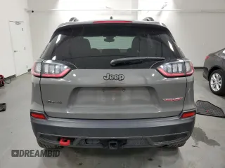 2022 Jeep Cherokee Trailhawk with VIN 1C4PJMBXXND556183, listed as a Copart auction lot 49327555 with 45,947 mi miles and Clean Title. Bid and sale history available at carsss.com. Image 6.