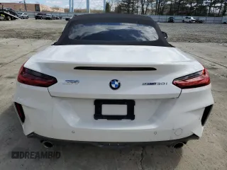 2021 BMW Z4 sDrive30i with VIN WBAHF3C09MWX24087, listed as a Copart auction lot 52036575 with 0 mi miles and Salvage Title. Bid and sale history available at carsss.com. Image 6.