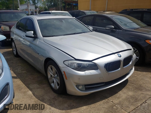 2013 BMW 5 Series 528i with VIN WBAXG5C5XDD233958, listed as a Copart auction lot 54002195 with 103,543 mi miles and Clean Title. Bid and sale history available at carsss.com. Image 1.