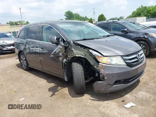 2016 Honda Odyssey Touring Elite with VIN 5FNRL5H97GB038805, listed as a IAAI auction lot 42577283 with 129,571 mi miles and . Bid and sale history available at DreamBid. Image 1.