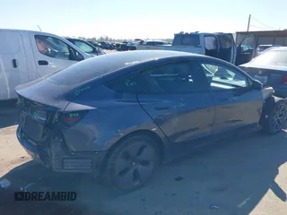 2022 Tesla Model 3 with VIN 5YJ3E1EAXNF326354, listed as a IAAI auction lot 41651872 with 27,922 mi miles and . Bid and sale history available at DreamBid. Image 4.