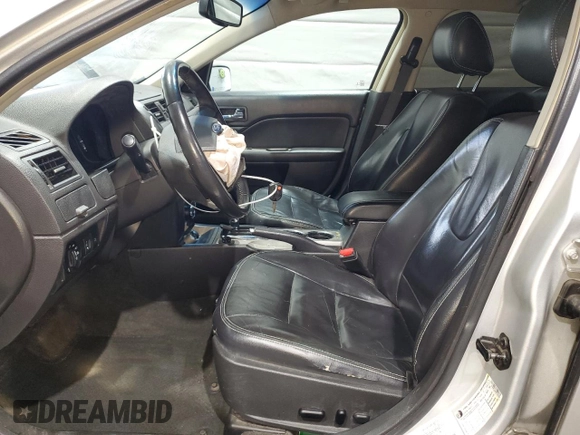 2012 Ford Fusion SEL with VIN 3FAHP0JG8CR195964, listed as a Copart auction lot 50007785 with 161,935 mi miles and Salvage Title. Bid and sale history available at DreamBid. Image 7.