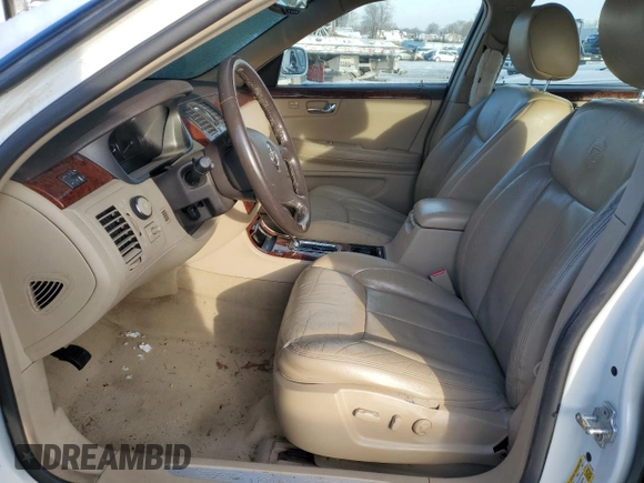2007 Cadillac DTS Luxury I z VIN 1G6KD57Y57U223002, wystawiony jako Copart lot #87247984 z przebiegiem Nie podano mil oraz Szkoda całkowita • Salvage title. Historia ofert i sprzedaży dostępna na DreamBid. Obrazek 7.