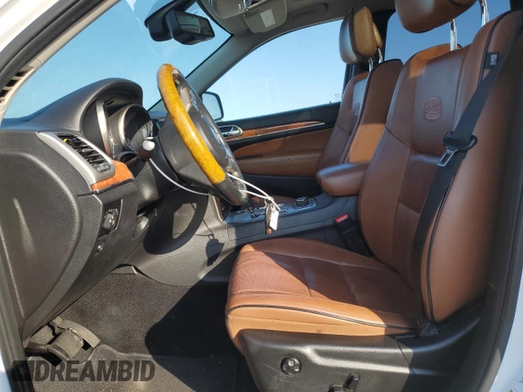 2013 Jeep Grand Cherokee Overland with VIN 1C4RJFCG8DC639408, listed as a Copart auction lot 77910444 with 89,623 mi miles and Salvage Title. Bid and sale history available at carsss.com. Image 7.