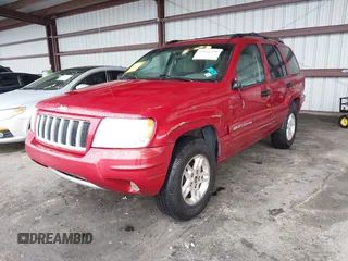 2004 Jeep Grand Cherokee z VIN 1J8GX48SX4C329289, wystawiony jako IAAI lot #41631610 z przebiegiem 212 362 mil mil oraz . Historia ofert i sprzedaży dostępna na DreamBid. Obrazek 2.