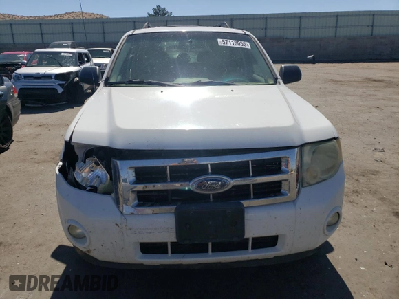 2008 Ford Escape XLT с VIN 1FMCU03128KC70462, выставлен на аукционе Copart как лот 57118055 с пробегом 215 790 миль миль и Списание • Salvage title. История ставок и продаж доступна на DreamBid. Изображение 5.