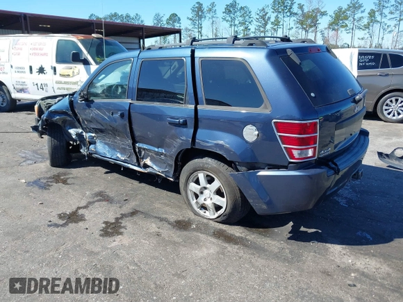 2009 Jeep Grand Cherokee Laredo with VIN 1J8HR48P19C540785, listed as a IAAI auction lot 41729851 with 205,504 mi miles. Bid and sale history available at carsss.com. Image 3.