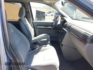 2004 Ford Freestar SEL z VIN 2FMDA52264BA43428, wystawiony jako IAAI lot #41872931 z przebiegiem 118 764 mil mil oraz . Historia ofert i sprzedaży dostępna na DreamBid. Obrazek 5.