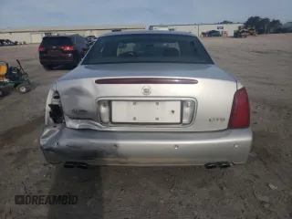 2003 Cadillac DeVille DTS z VIN 1G6KF57973U163124, wystawiony jako Copart lot #78054584 z przebiegiem 111 189 mil mil oraz Szkoda całkowita • Salvage title. Historia ofert i sprzedaży dostępna na DreamBid. Obrazek 6.