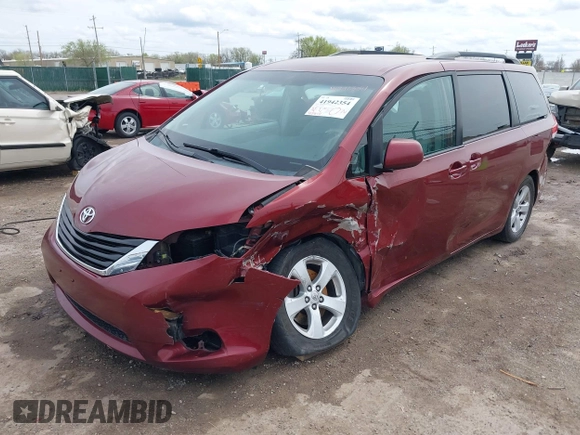 2014 Toyota Sienna LE AAS with VIN 5TDKK3DC4ES462090, listed as a IAAI auction lot 41942354 with 215,814 mi miles. Bid and sale history available at carsss.com. Image 17.