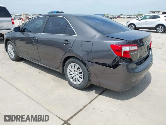2014 Toyota Camry L with VIN 4T4BF1FKXER379158, listed as a IAAI auction lot 42050926 with 88,060 mi miles and . Bid and sale history available at DreamBid. Image 3.