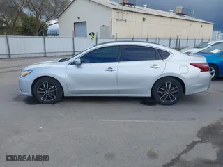 2018 Nissan Altima 2.5 SL with VIN 1N4AL3AP8JC216628, listed as a IAAI auction lot 41789254 with 135,965 mi miles. Bid and sale history available at carsss.com. Image 14.