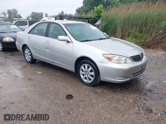 2002 Toyota Camry XLE z VIN JTDBF30K420083381, wystawiony jako IAAI lot #42368073 z przebiegiem 148 746 mil mil oraz . Historia ofert i sprzedaży dostępna na DreamBid. Obrazek 1.