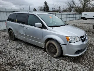2011 Dodge Grand Caravan Crew with VIN 2D4RN5DG6BR693469, listed as a Copart auction lot 50952085 with 209,501 mi miles and Clean Title. Bid and sale history available at DreamBid. Image 4.