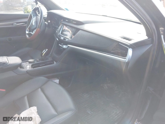 2023 Cadillac XT6 Luxury with VIN 1GYKPBR41PZ136918, listed as a IAAI auction lot 41417724 with 57,949 mi miles. Bid and sale history available at carsss.com. Image 5.