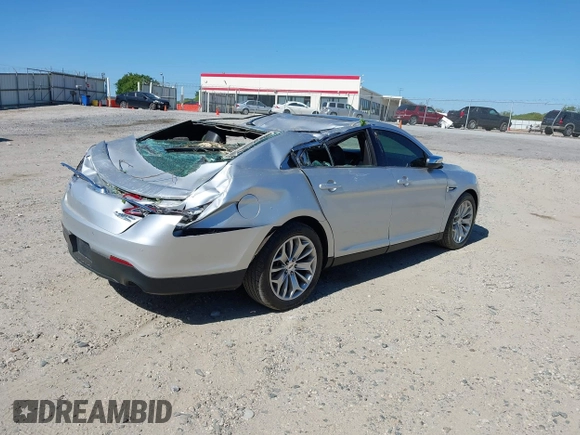 2016 Ford Taurus Limited with VIN 1FAHP2F86GG111666, listed as a IAAI auction lot 42062953 with 64,813 mi miles and . Bid and sale history available at carsss.com. Image 4.
