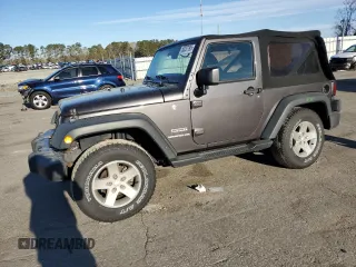 2016 Jeep Wrangler Willys Wheeler z VIN 1C4AJWAG5GL266235, wystawiony jako Copart lot #50237195 z przebiegiem 60 830 mil mil oraz Szkoda całkowita • Salvage title. Historia ofert i sprzedaży dostępna na DreamBid. Obrazek 1.