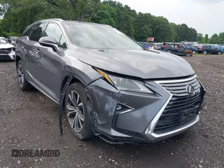 2018 Lexus RX 350L Premium z VIN JTJDZKCA6J2011546, wystawiony jako IAAI lot #42730403 z przebiegiem 91 289 mil mil oraz . Historia ofert i sprzedaży dostępna na DreamBid. Obrazek 1.