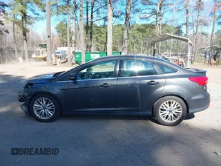 2015 Ford Focus Titanium with VIN 1FADP3J25FL333743, listed as a IAAI auction lot 41857057 with 120,917 mi miles and . Bid and sale history available at carsss.com. Image 15.