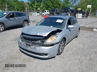 2007 Nissan Altima SL with VIN 1N4BL21E27C107569, listed as a IAAI auction lot 42061514 with 155,040 mi miles and . Bid and sale history available at DreamBid. Image 2.