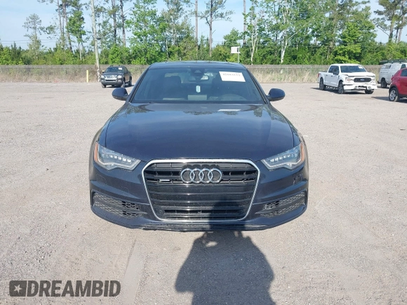 2015 Audi A6 3.0T Prestige with VIN WAUHGAFC3FN011654, listed as a IAAI auction lot 42104153 with 166,719 mi miles. Bid and sale history available at carsss.com. Image 12.