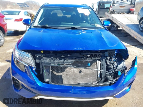 2021 Kia Seltos EX with VIN KNDERCAAXM7167273, listed as a IAAI auction lot 41839652 with 64,256 mi miles and . Bid and sale history available at DreamBid. Image 6.