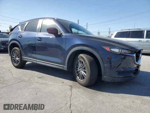2019 Mazda CX-5 Touring with VIN JM3KFBCM0K0697813, listed as a Copart auction lot 52239505 with 49,844 mi miles and Salvage Title. Bid and sale history available at carsss.com. Image 4.