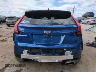 2023 Cadillac XT4 FWD Premium Luxury z VIN 1GYFZCR49PF104995, wystawiony jako Copart lot #53312695 z przebiegiem 28 647 mil mil oraz Szkody całkowita. Historia ofert i sprzedaży dostępna na DreamBid. Obrazek 6.