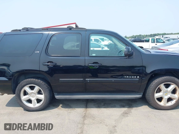 2007 Chevrolet Tahoe LTZ with VIN 1GNFC13007R111180, listed as a IAAI auction lot 42381749 with 126,472 mi miles and . Bid and sale history available at DreamBid. Image 13.