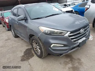 2017 Hyundai Tucson Value with VIN KM8J33A22HU358357, listed as a IAAI auction lot 41583774 with 139,338 mi miles. Bid and sale history available at carsss.com. Image 1.