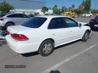 2001 Honda Accord EX z VIN 1HGCG16501A074615, wystawiony jako IAAI lot #42297708 z przebiegiem 187 936 mil mil oraz . Historia ofert i sprzedaży dostępna na DreamBid. Obrazek 4.