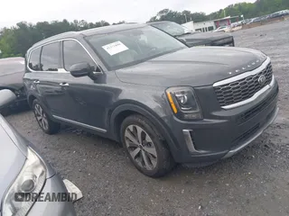 2021 Kia Telluride S with VIN 5XYP64HC8MG127498, listed as a IAAI auction lot 42371890 with 100,748 mi miles and . Bid and sale history available at DreamBid. Image 1.