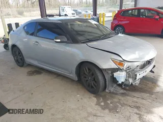 2014 Scion tC with VIN JTKJF5C71E3069593, listed as a IAAI auction lot 41901040 with 86,231 mi miles. Bid and sale history available at carsss.com. Image 1.