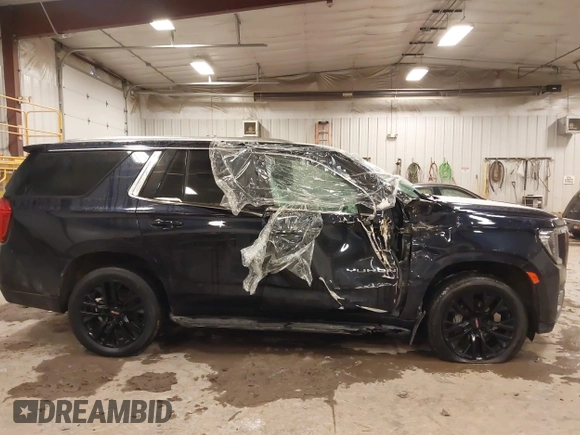 2021 GMC Yukon SLE with VIN 1GKS2AKD5MR404460, listed as a IAAI auction lot 41468575 with 49,917 mi miles. Bid and sale history available at carsss.com. Image 13.