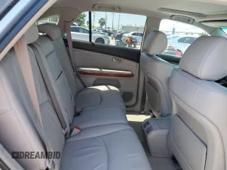 2007 Lexus RX 350 z VIN 2T2GK31UX7C025446, wystawiony jako Copart lot #52860455 z przebiegiem 198 999 mil mil oraz Nie do naprawy • Non repairable. Historia ofert i sprzedaży dostępna na DreamBid. Obrazek 11.