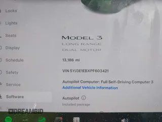 2023 Tesla Model 3 Long Range with VIN 5YJ3E1EBXPF603421, listed as a IAAI auction lot 42105037 with 13,186 mi miles and . Bid and sale history available at DreamBid. Image 7.