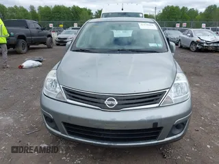 2012 Nissan Versa S z VIN 3N1BC1CP7CK800017, wystawiony jako IAAI lot #42270666 z przebiegiem 152 790 mil mil oraz . Historia ofert i sprzedaży dostępna na DreamBid. Obrazek 12.